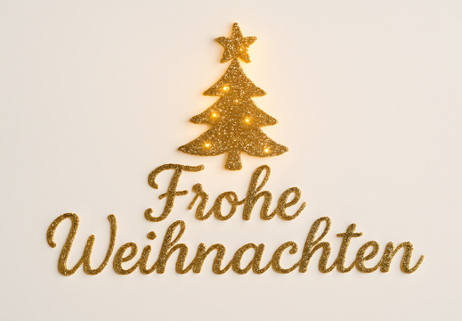 Frohe Weihnachten Glitzerschrift mit leuchtendem Weihnachtsbaum
